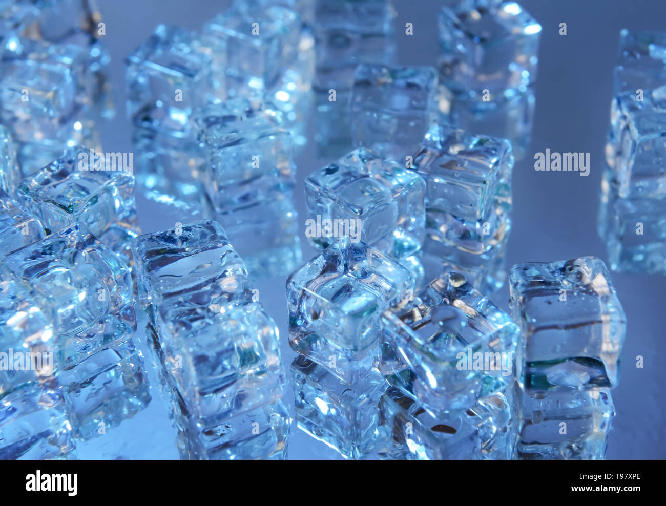 Ice cubes on table Stock Photo