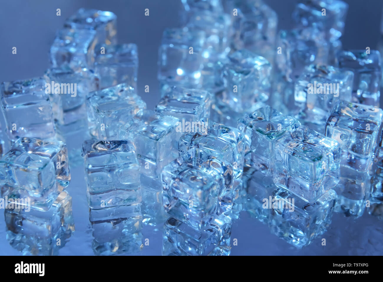 Ice cubes on table Stock Photo