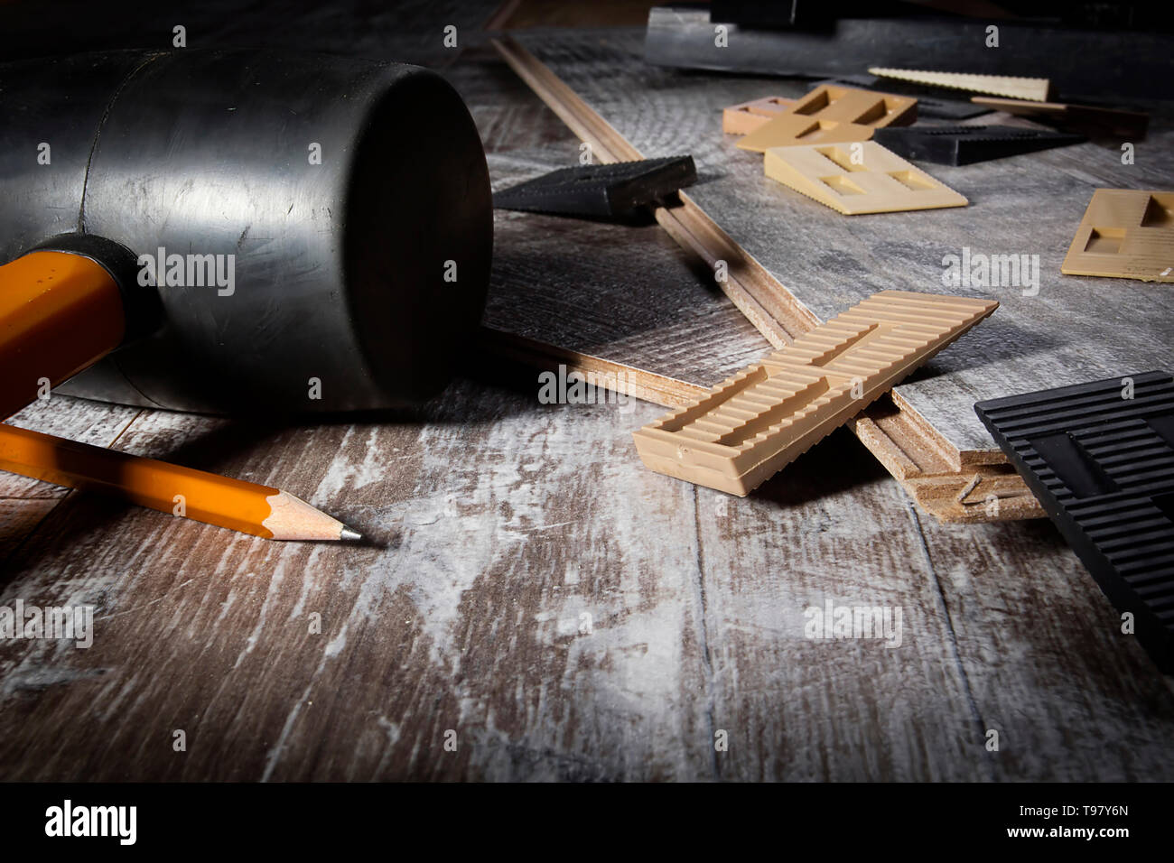 Laminate and various tools for its installation Stock Photo - Alamy