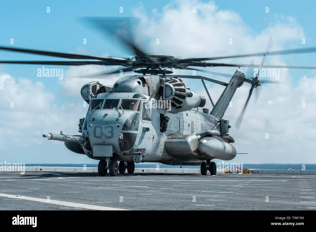 190513-M-QS181-0020 PACIFIC OCEAN (May 13, 2019) U.S. Marines with Marine Aircraft Group (MAG) 24 land a CH-53 Super Stallion on the flight deck of the San Antonio-class amphibious transport dock ship USS John P. Murtha (LPD 26). The Marines and Sailors of the 11th Marine Expeditionary Unit are conducting routine operations as part of the Boxer Amphibious Ready Group. (U.S. Marine Corps photo by Cpl. Jason Monty) Stock Photo