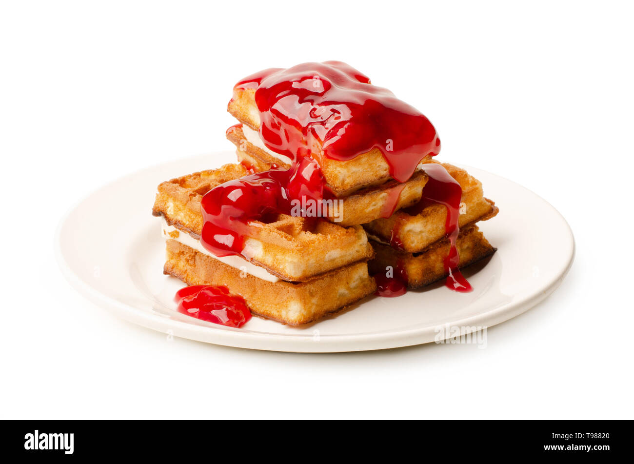 Portion of viennese waffles with sweet strawberry syrup isolated on a white background Stock Photo