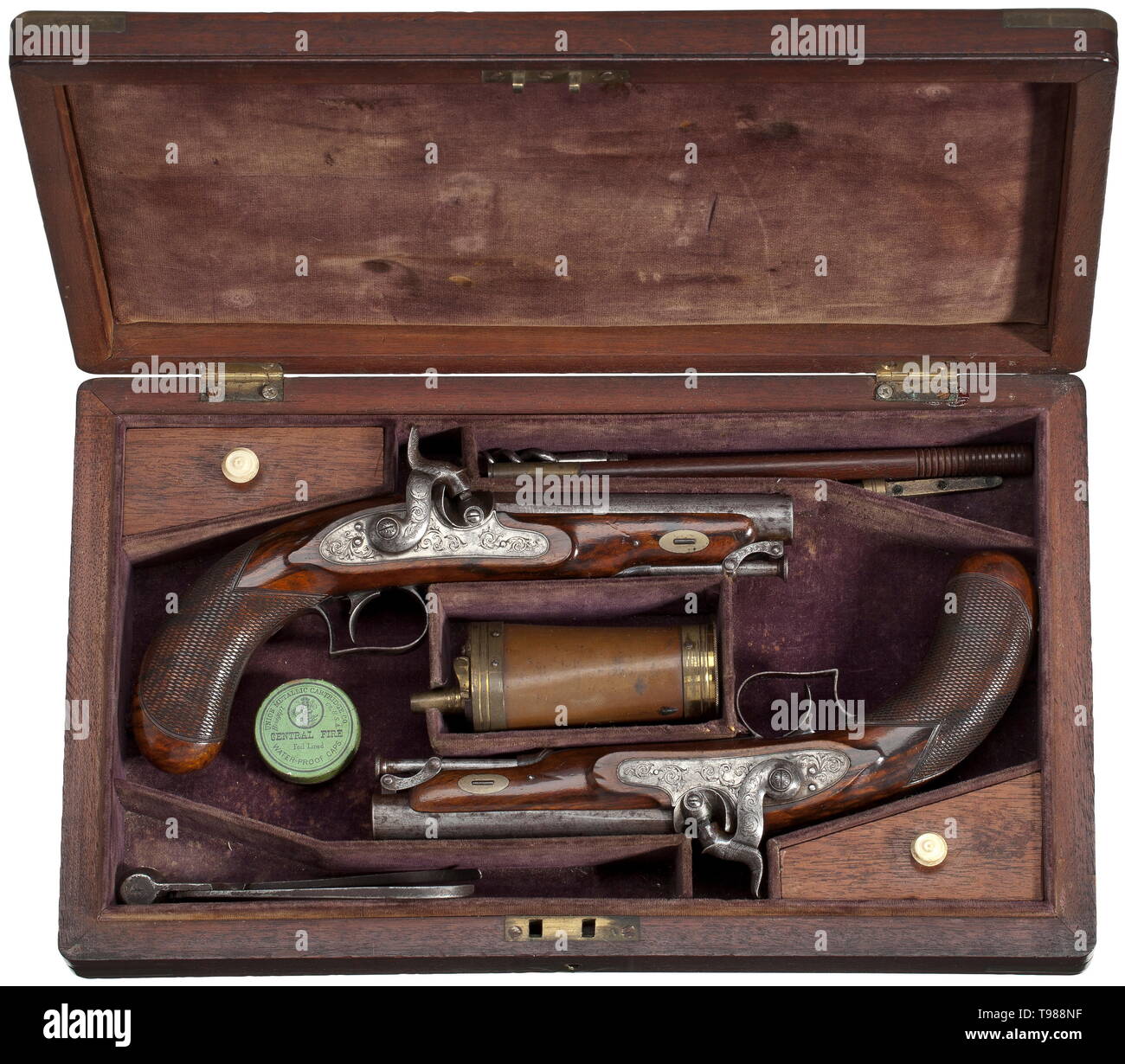 A pair of cased percussion pistols, a present to Constable John Boulton, Birmingham, 1839 Rifled barrels with flattened tops in 12.5 mm calibre, bores with good groove/land profile, engraved and decorated with gold band inlays over the chamber, the barrel tops featuring the owner's name. Percussion locks engraved with fine scrolling leaves. Beautifully grained walnut stocks with remains of bluing and en suite engraved iron furniture. Hinged ramrods. Length 24.5 cm. In slightly faded and rubbed, purple velvet-lined ma 19th century, Additional-Rights-Clearance-Info-Not-Available Stock Photo