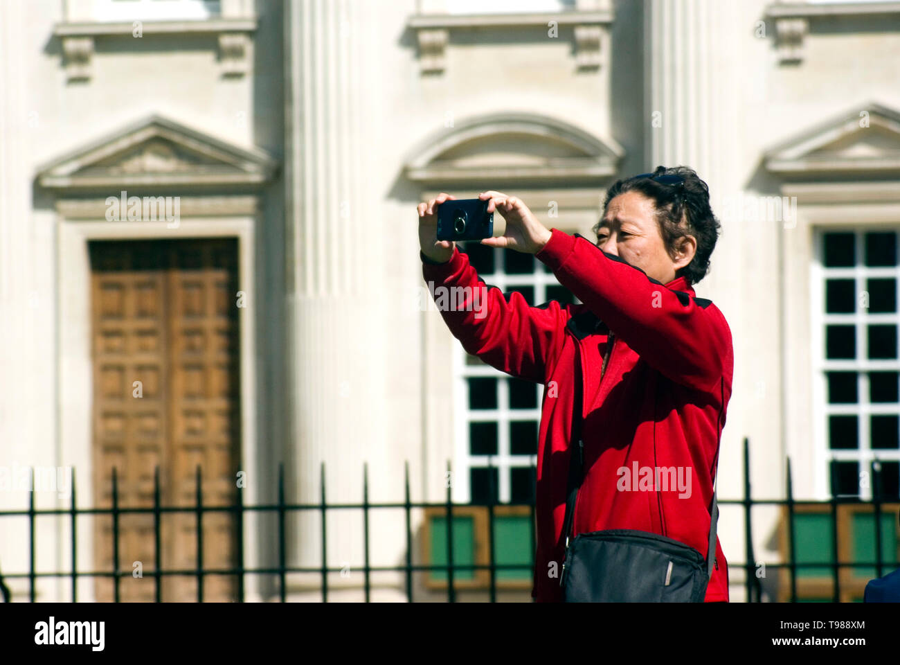 Tourist Taking Photographs, Cambridge Stock Photo