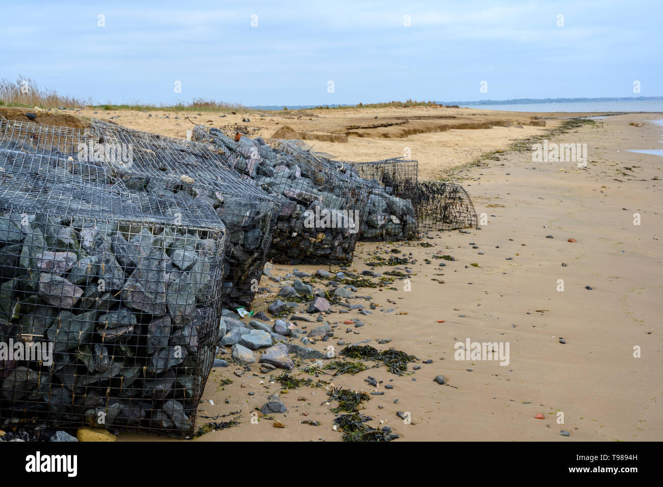 Rock armour coastal defences, WaltonontheNaze, Essex, UK Stock Photo