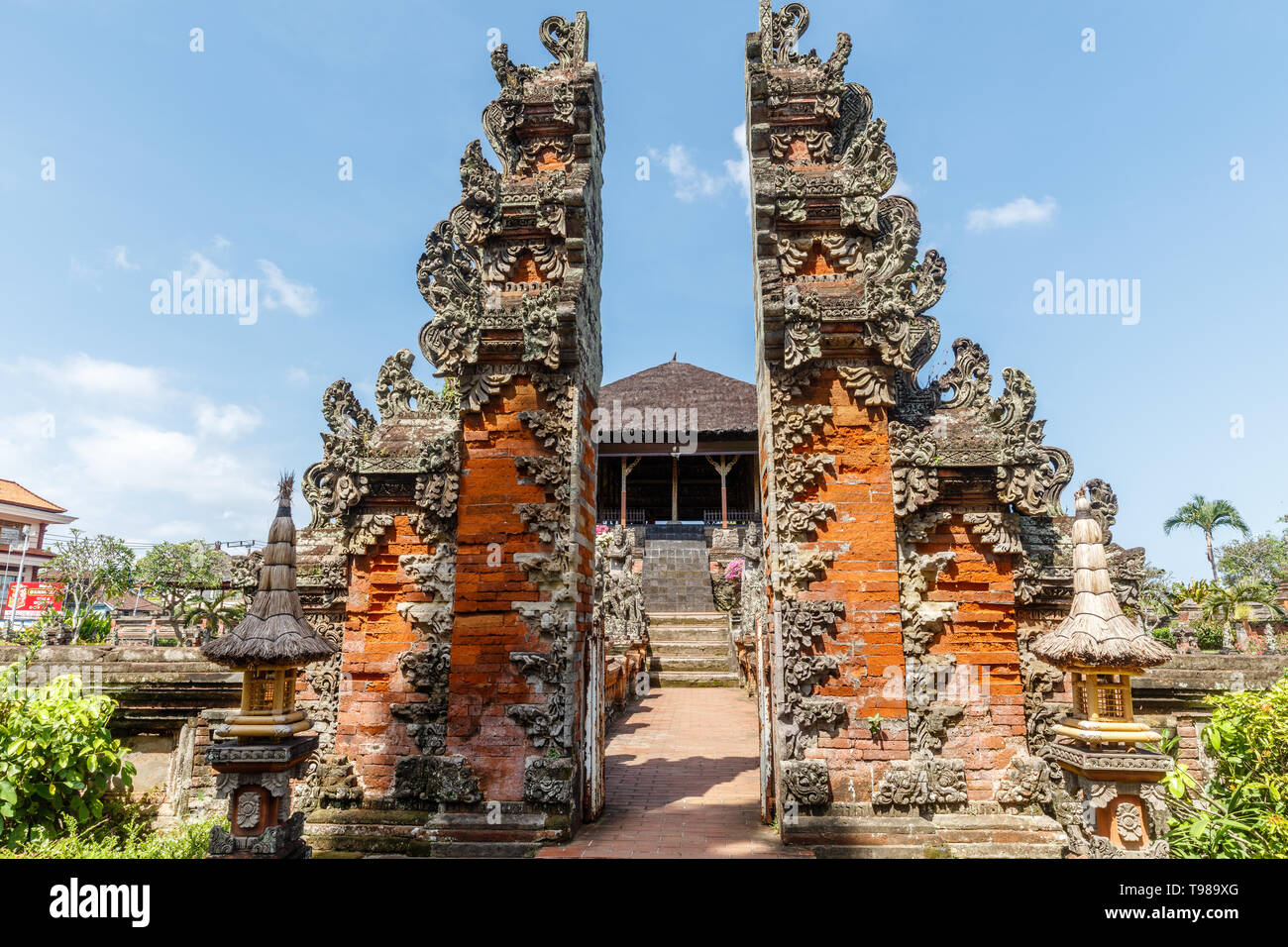Carved stone gates cadi bentar at Bale Kembang (Floating pavilion) at Taman Gili Kertha Gosa, remains of a royal palace.  Semarapura, Klungkung, Bali Stock Photo