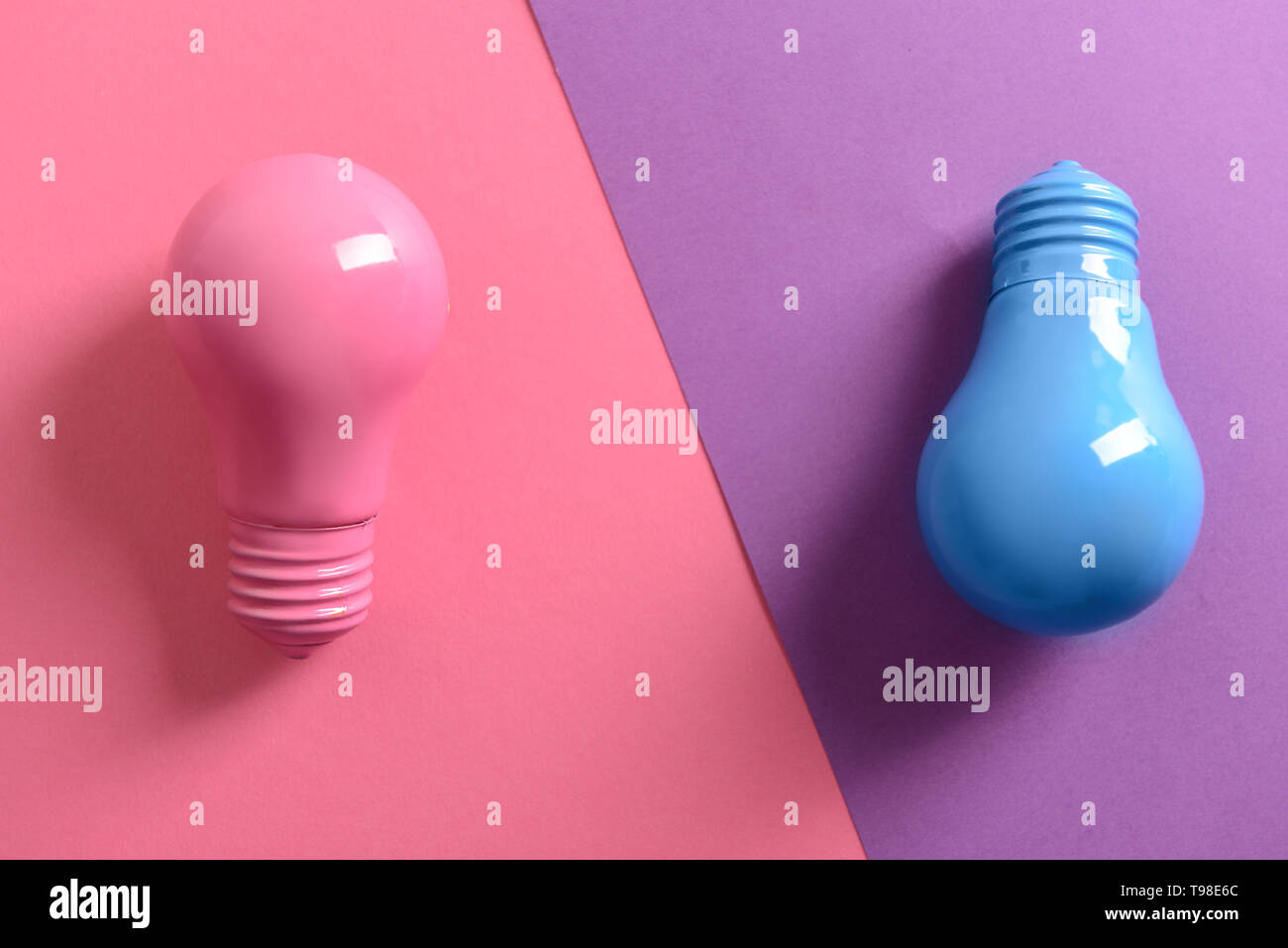 Painted light bulbs on color background Stock Photo