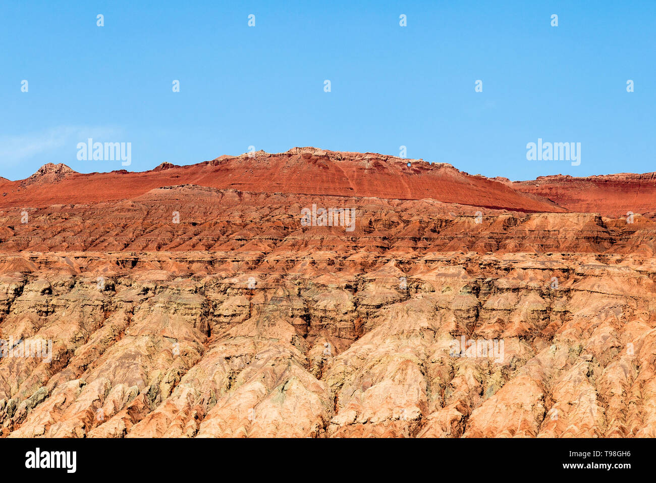 Flaming mountains, Turpan, Xinjiang, China: the top of these famous mountains that also appear in the Chinese epic Journey to the west is a deep red a Stock Photo