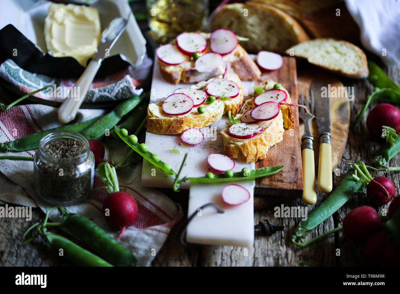 Butter and radish crostini Stock Photo Alamy