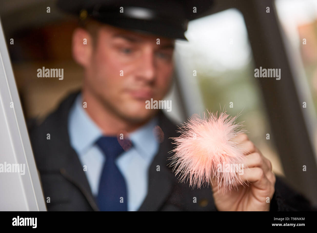 Policeman finds fingerprints at crime scene at crime scene Stock Photo