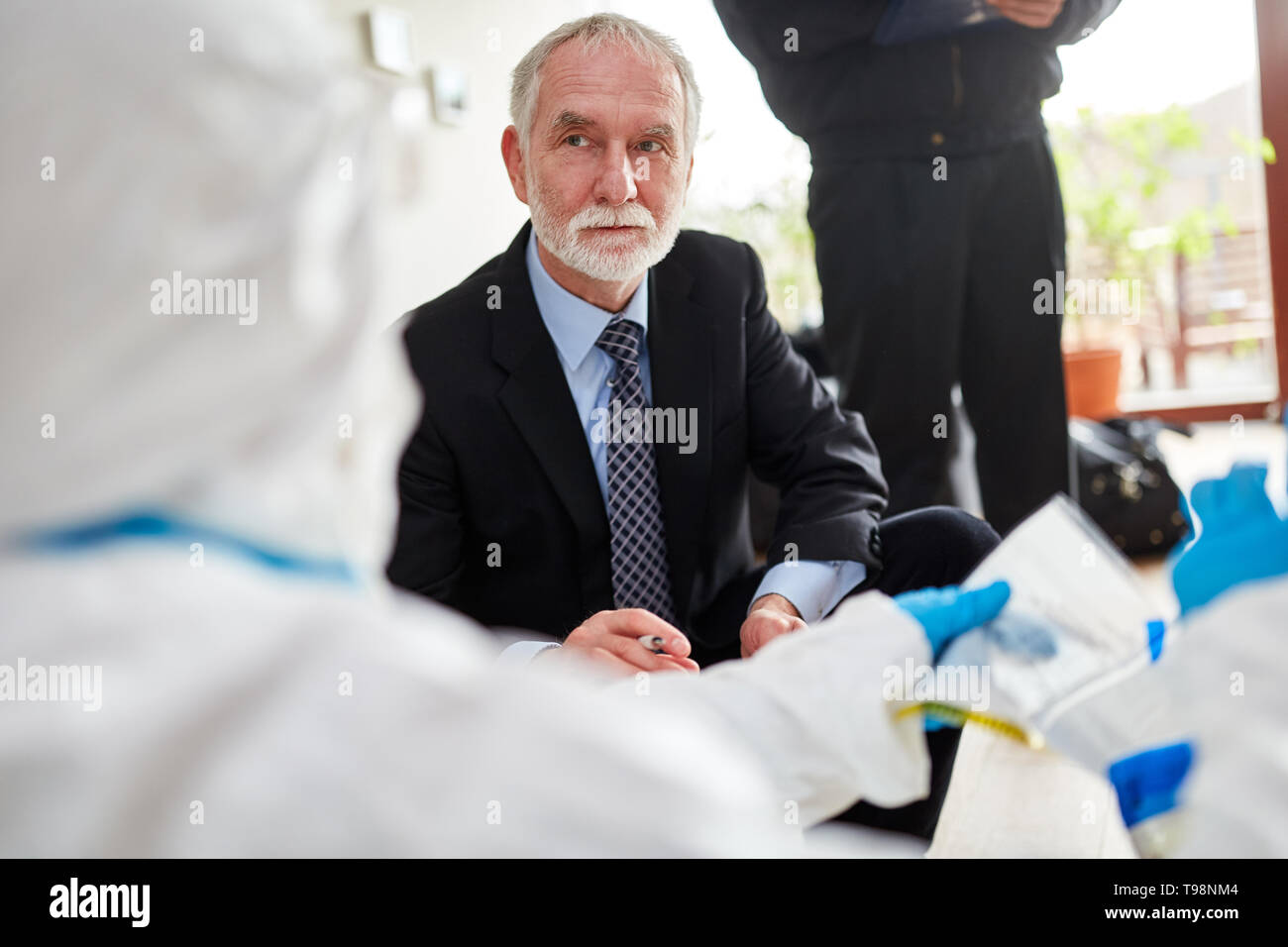 Criminal police and forensics at the scene of a crime Stock Photo