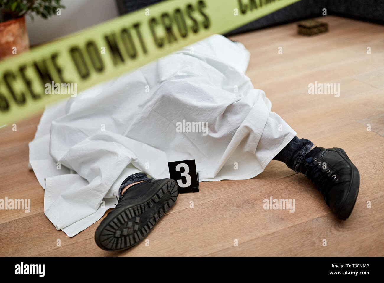 Dead body after murder at the scene after forensics by the police Stock Photo