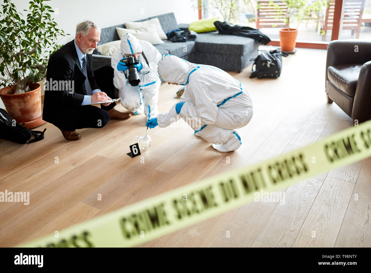 Police and Forensics work together at crime scene for a crime Stock Photo