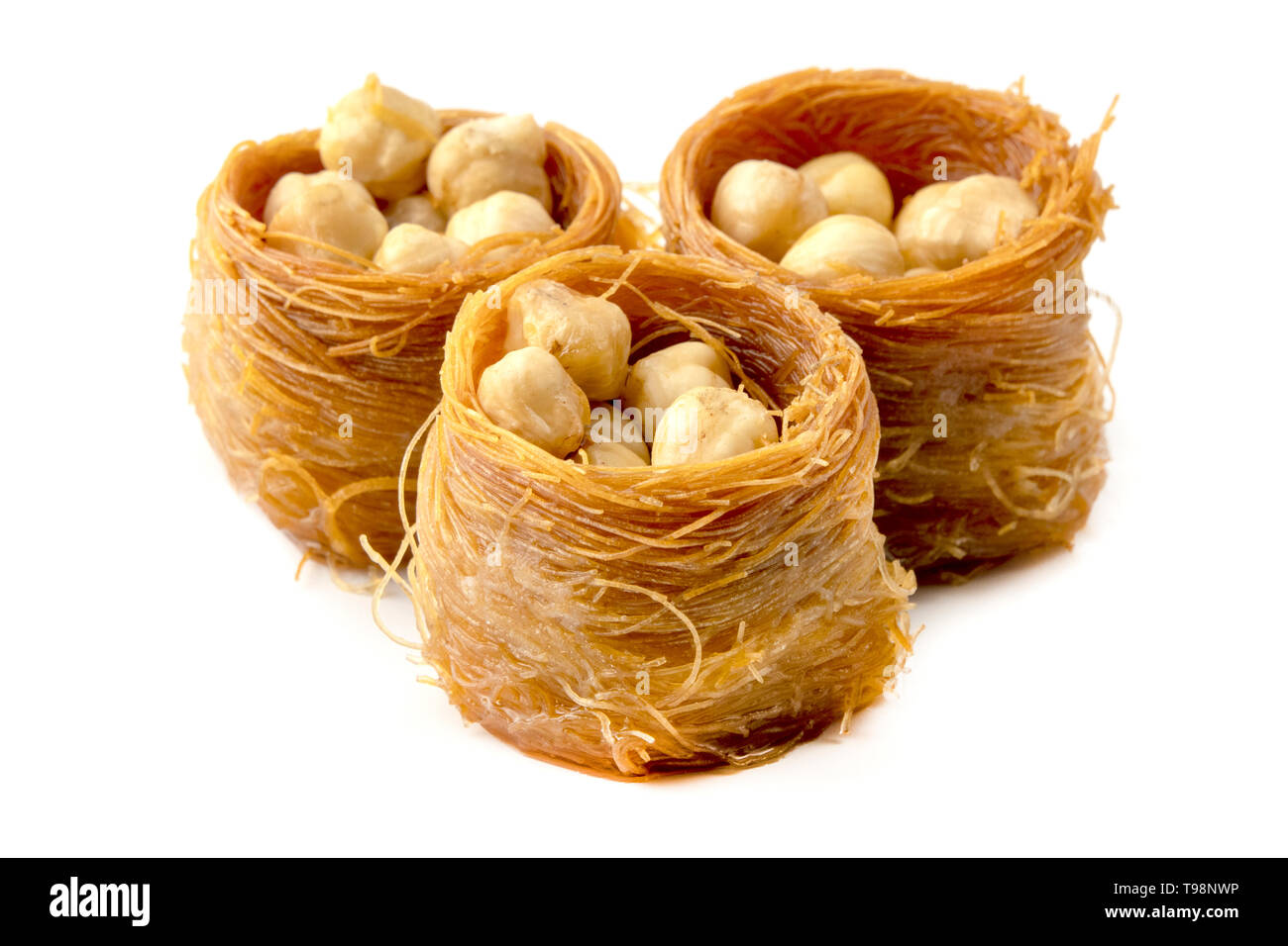 Bird nest baklava with nuts on a white background Stock Photo Alamy