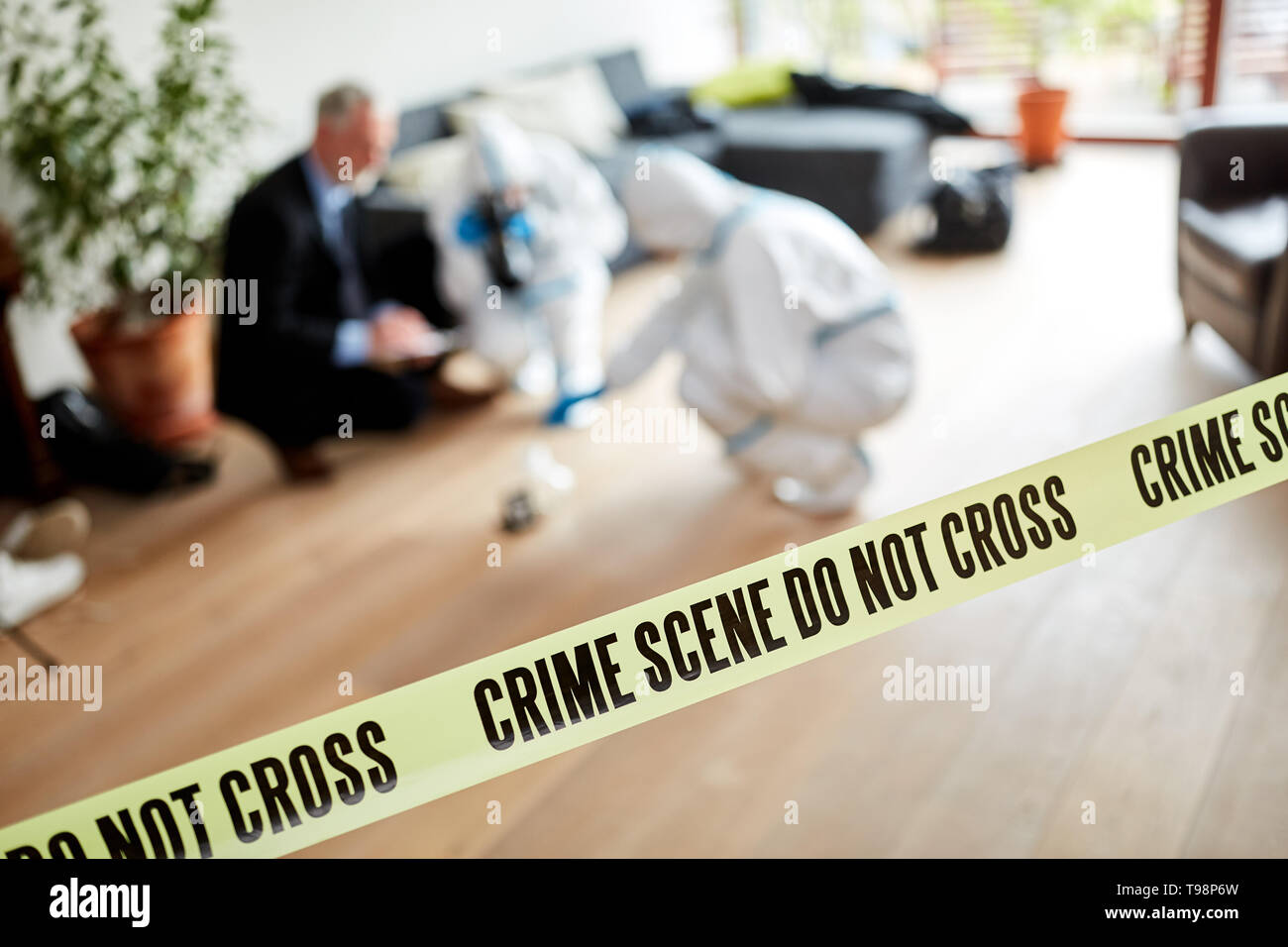 Locking the police at the scene after burglary or robbery Stock Photo