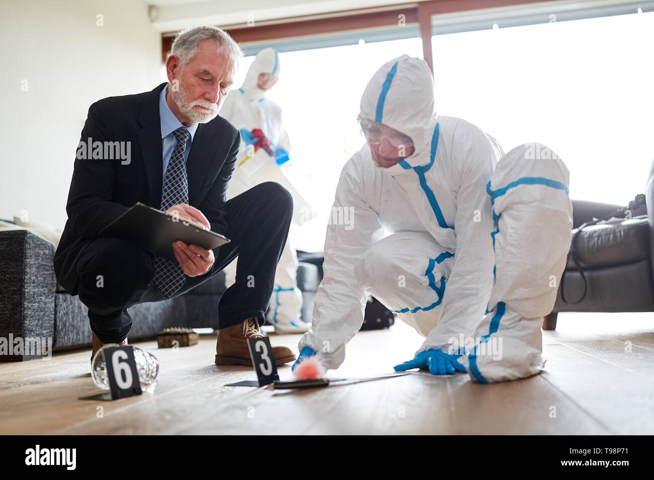 Crime police and forensics at the scene of a crime Stock Photo