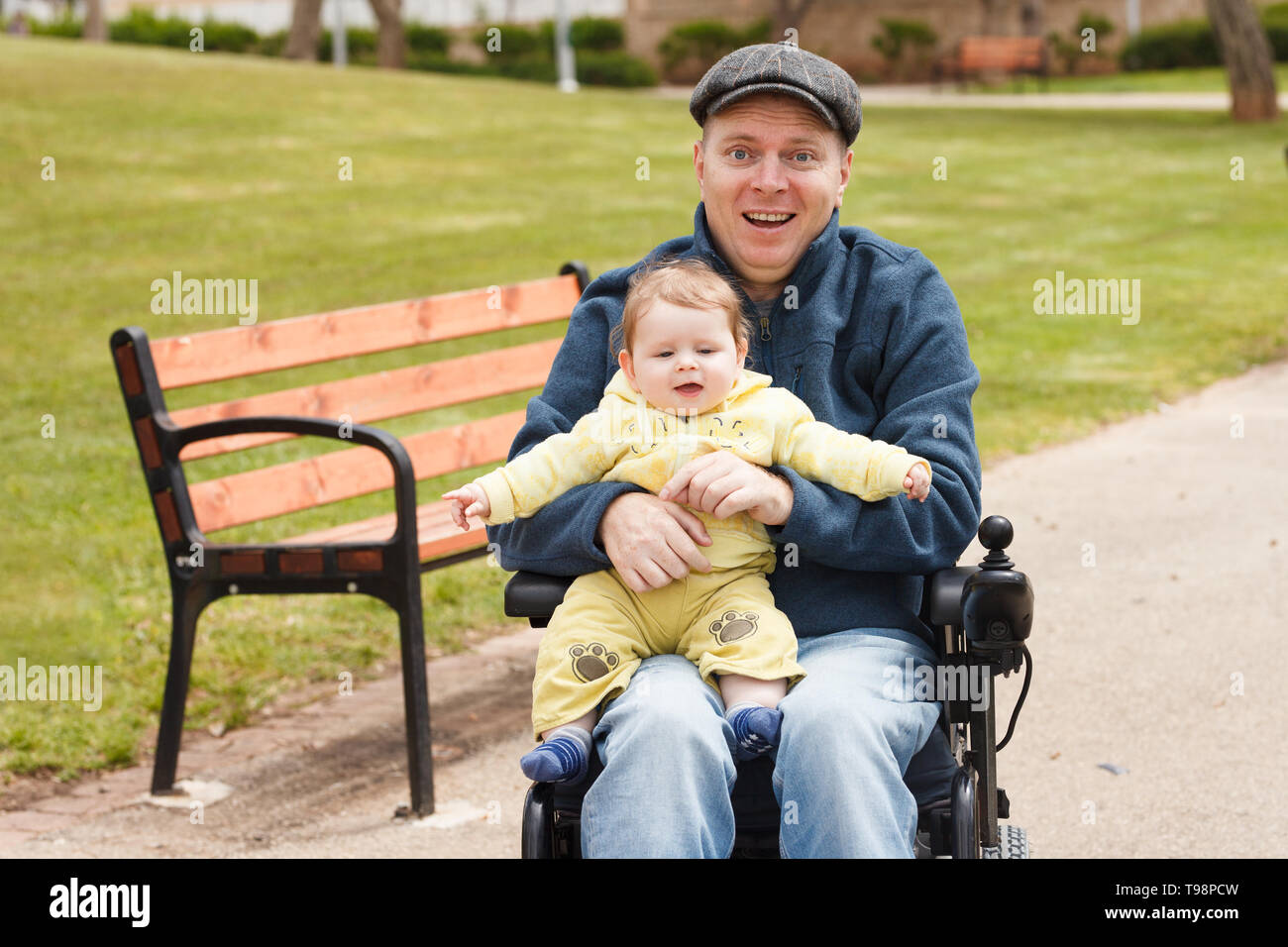 Disabled father play with his little son Stock Photo