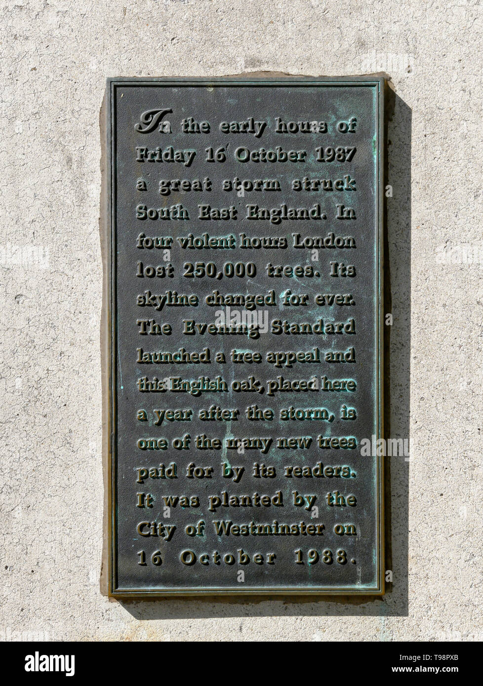 Commemorative plaque at Charing Cross, London, describing the great storm of October 1987 which struck southeast England destrying thousands of trees. Stock Photo