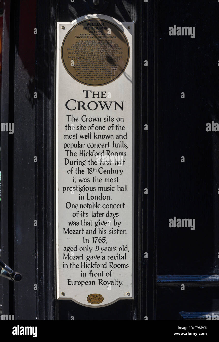 The Crown public house, Brewer Street, Soho, London, England, UK; plaque giving account of the history of the Hickford Rooms. Stock Photo