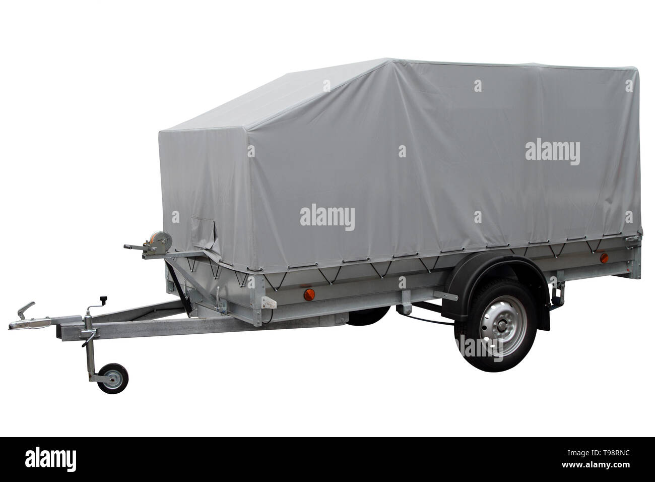 Modern Car trailer with canvas awning isolated on white background. Stock Photo