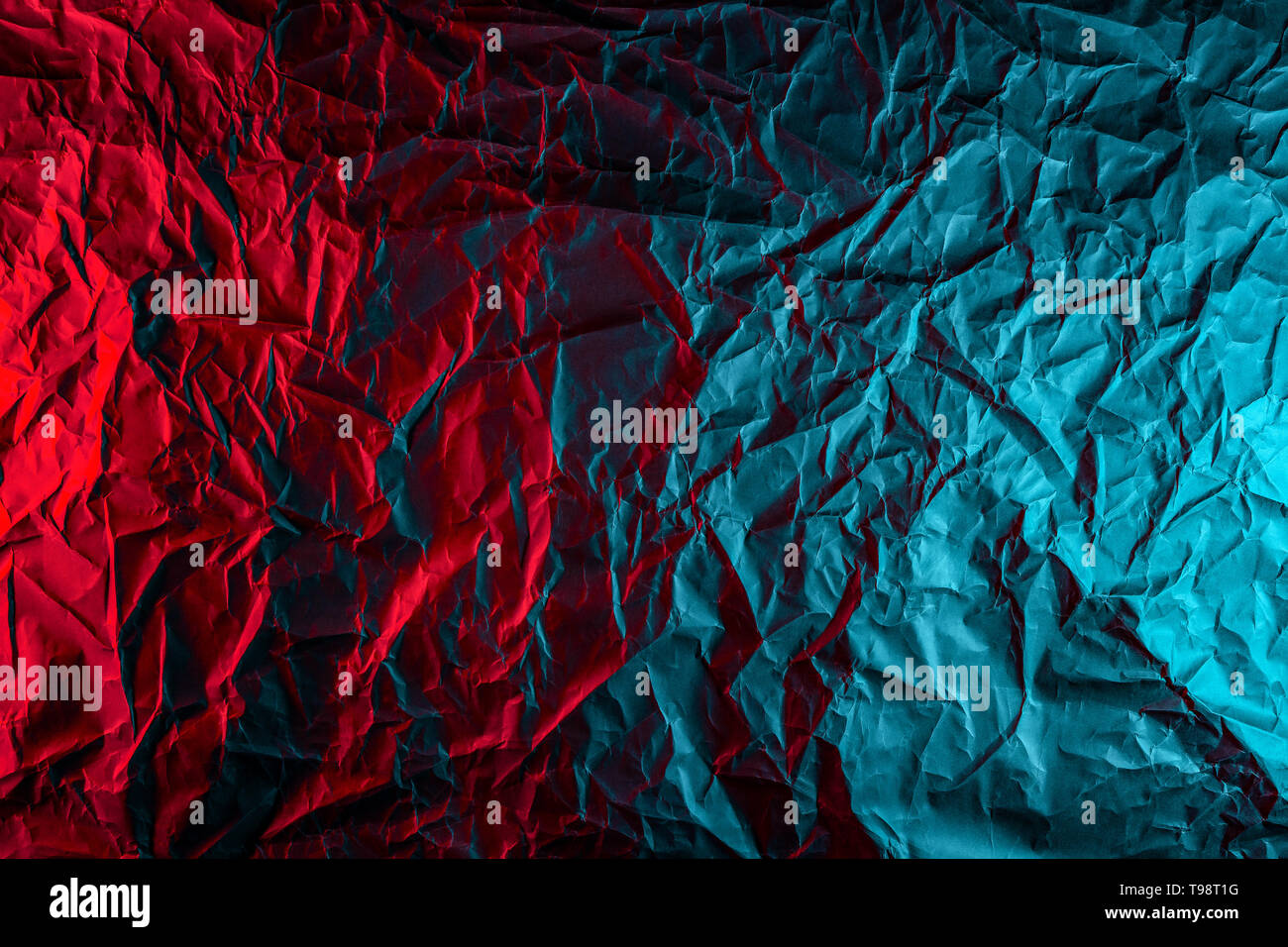 Texture Of Crumpled Black Paper Close Up Black Background Of Crumpled Cardboard Under Color Red And Blue Studio Light Stock Photo Alamy