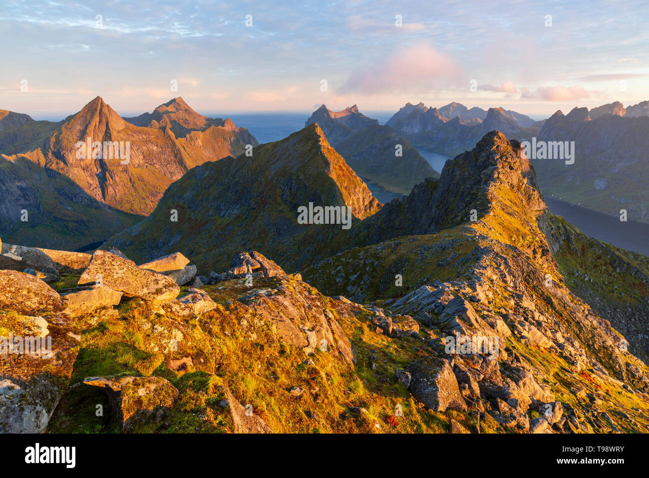 Morning atmosphere at Mount Munken with view to the east, Moskenesoya, Lofoten, Norway Stock Photo