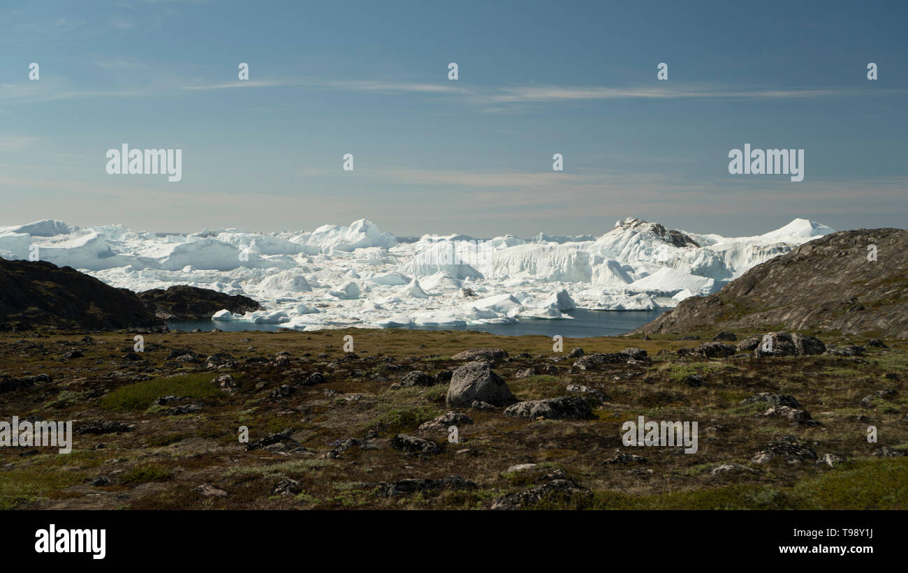 Icebergs in Disko Bay on Midsummer, Greenland Stock Photo