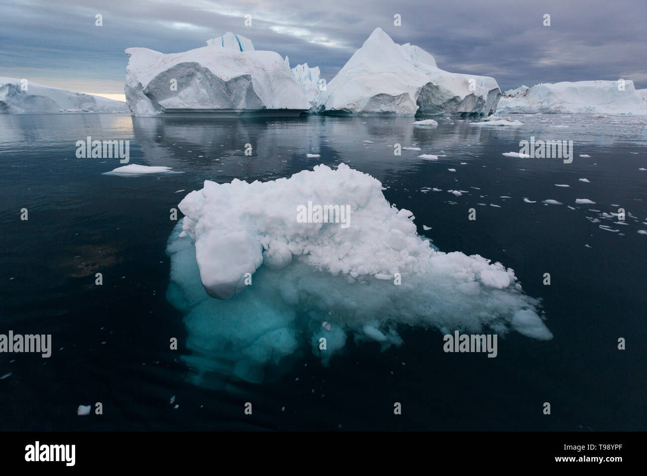 Icebergs in Disko Bay on Midsummer, Greenland Stock Photo