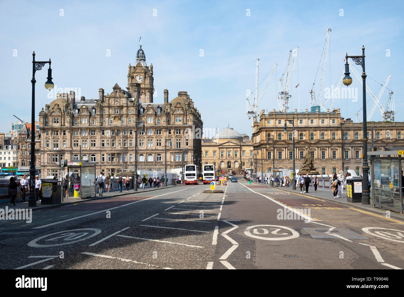 View of road crossing North Bridge with Balmoral hotel on left in Edinburgh, Scotland, UK Stock Photo