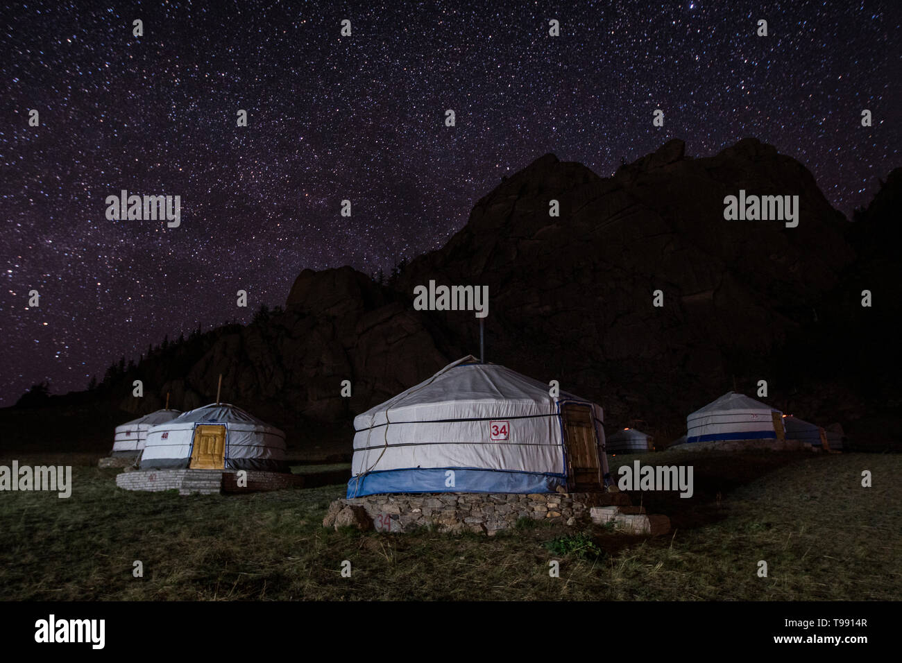Starry sky over yurts, Mongolia Stock Photo
