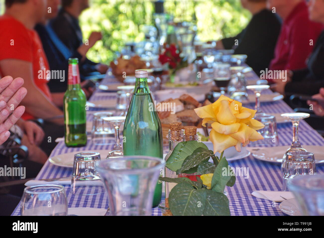 Rustic table prepared for dinner Stock Photo