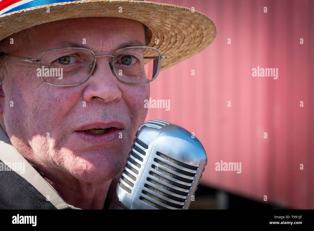 Old time singer at a steam engine rally Stock Photo Alamy
