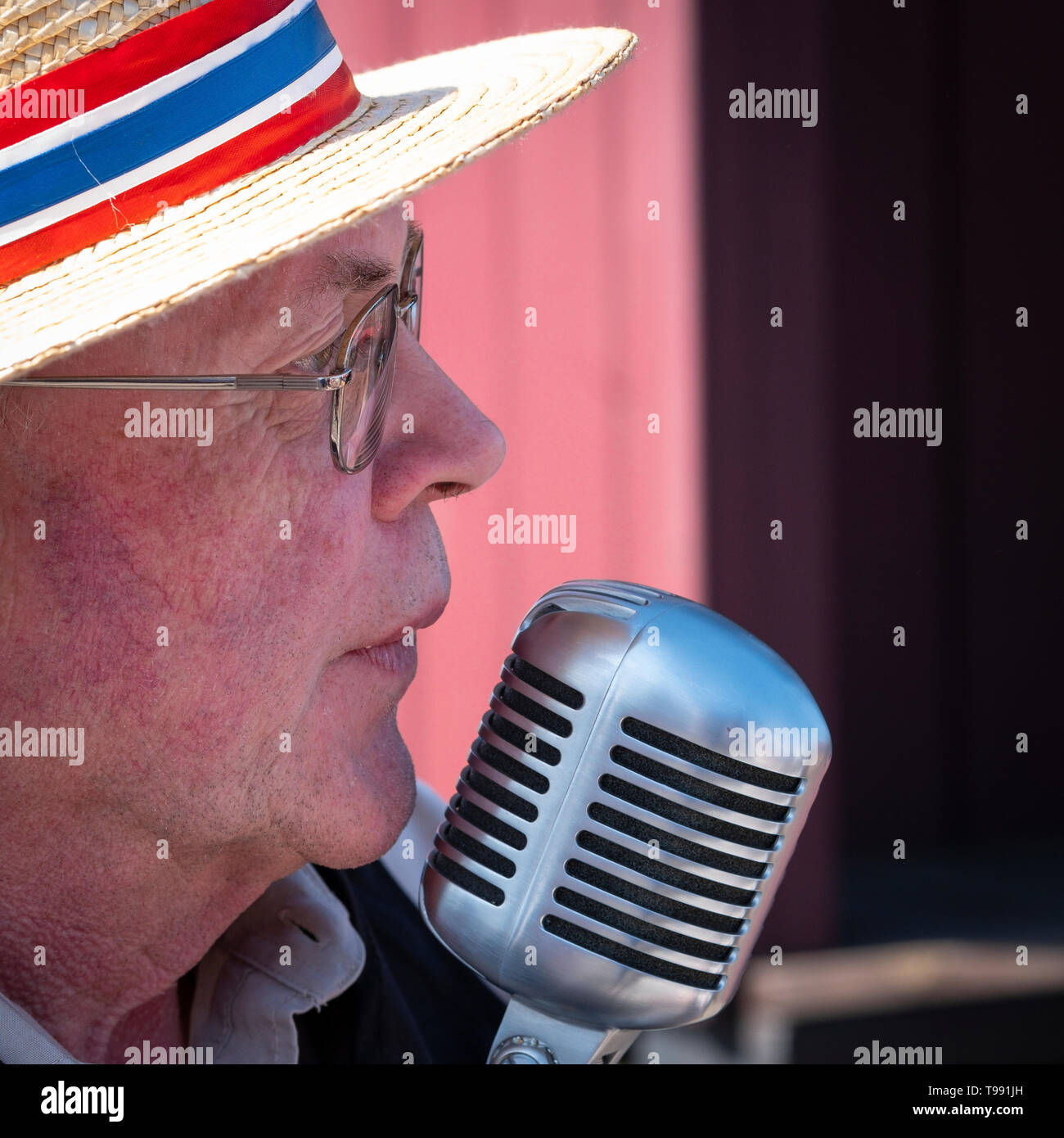 Old time singer at a steam engine rally. Stock Photo