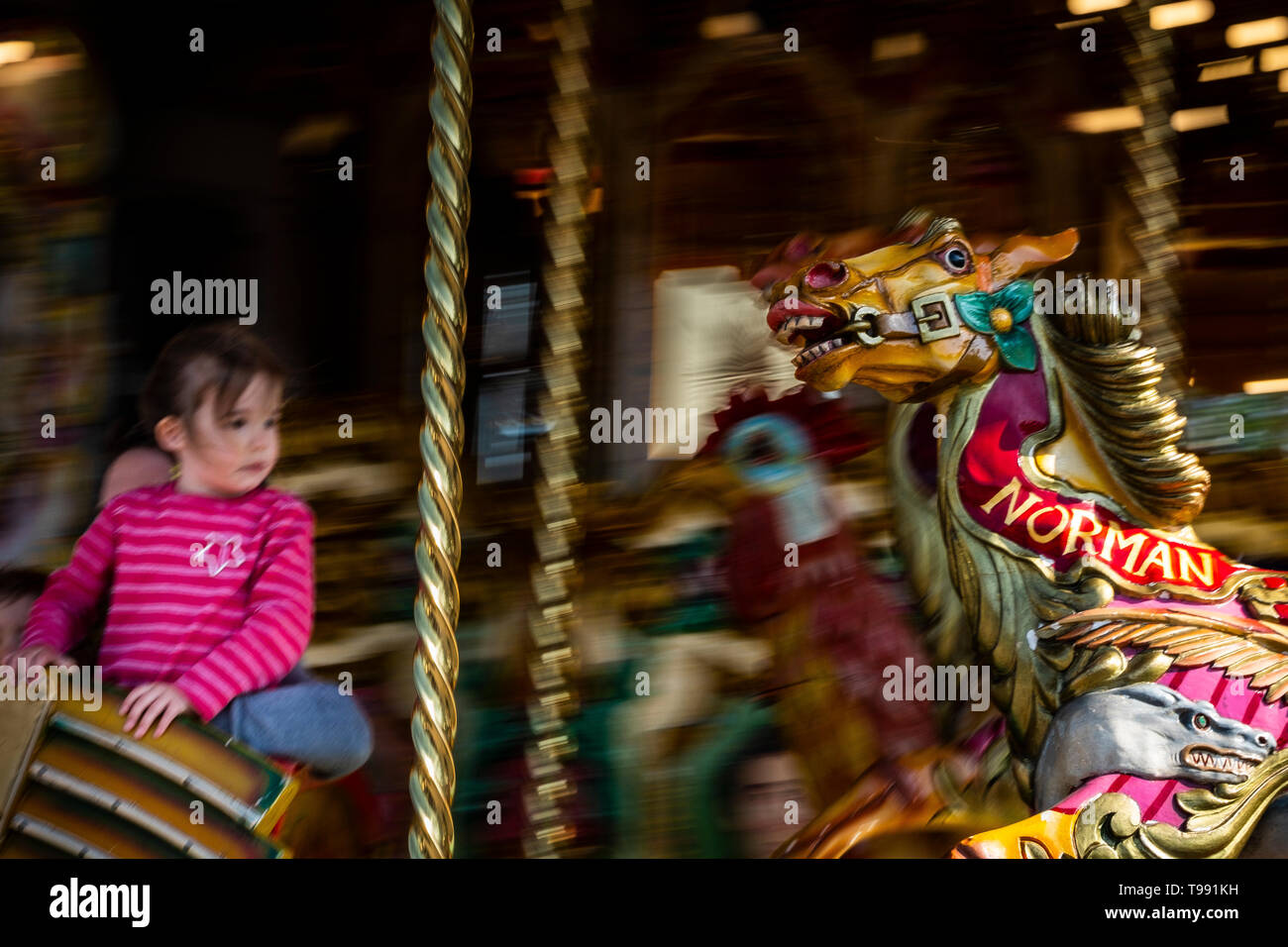 Steam powered carousel in action. Stock Photo