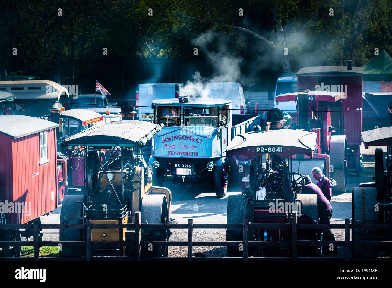 Steam rollers and a steam lorry at a rally. Stock Photo