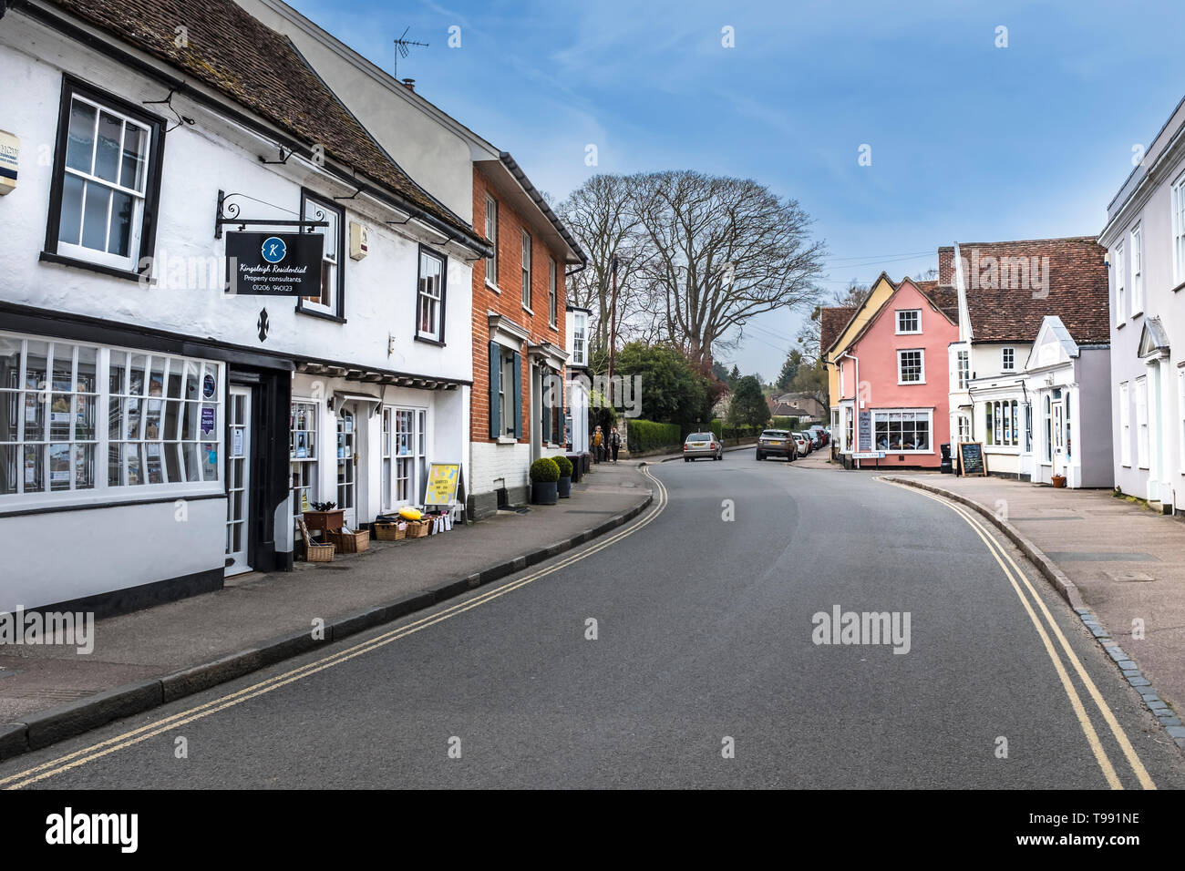 View along one of the streets lined with old houses in Dedham. Stock Photo