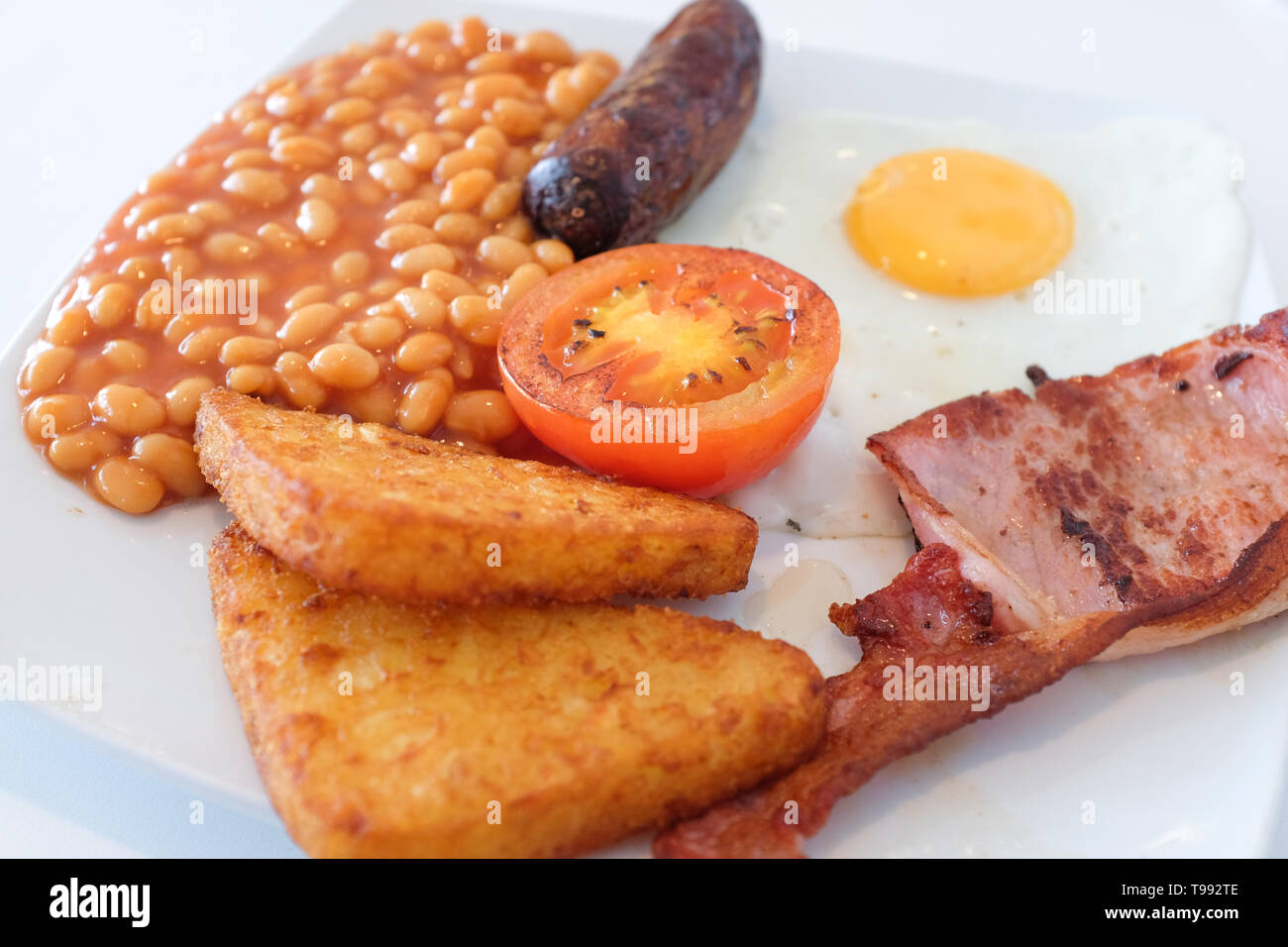 a-full-english-breakfast-comprising-egg-beans-sausage-hash-browns