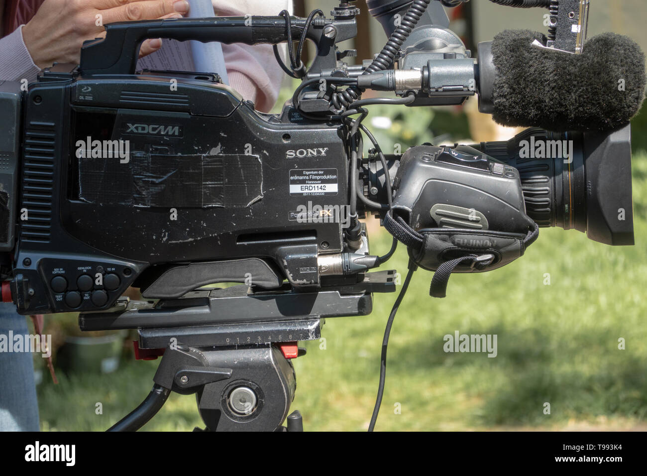 Hannover, Germany, May 12., 2019:Professional video cameras a local television station, old camera with worn out color, including audio system with di Stock Photo