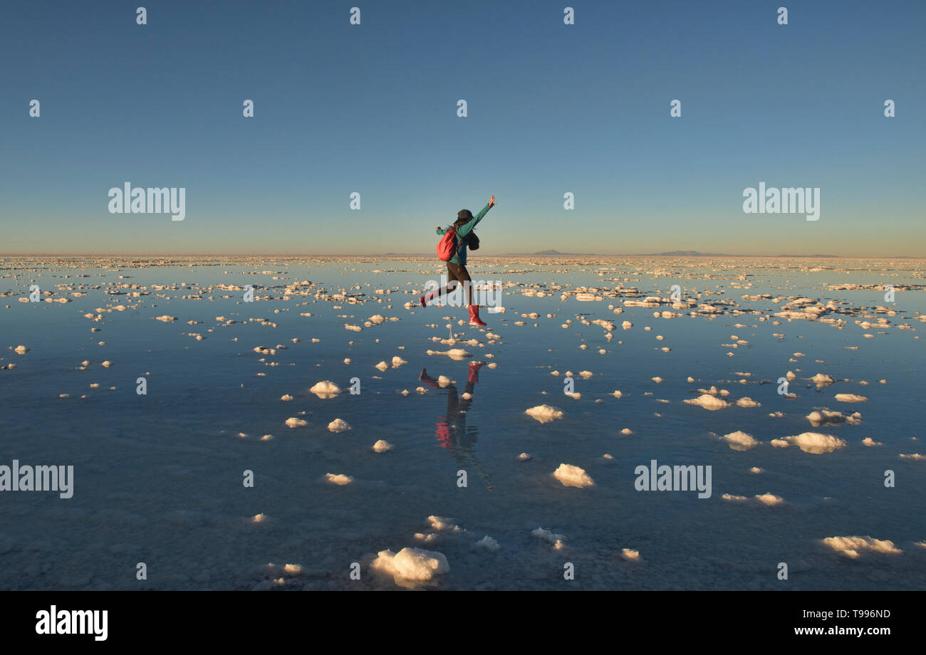Enjoying the world's largest mirror, reflections on the salt flats of