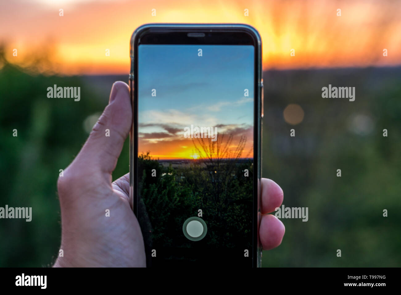 Taking photography of a Sunset Stock Photo