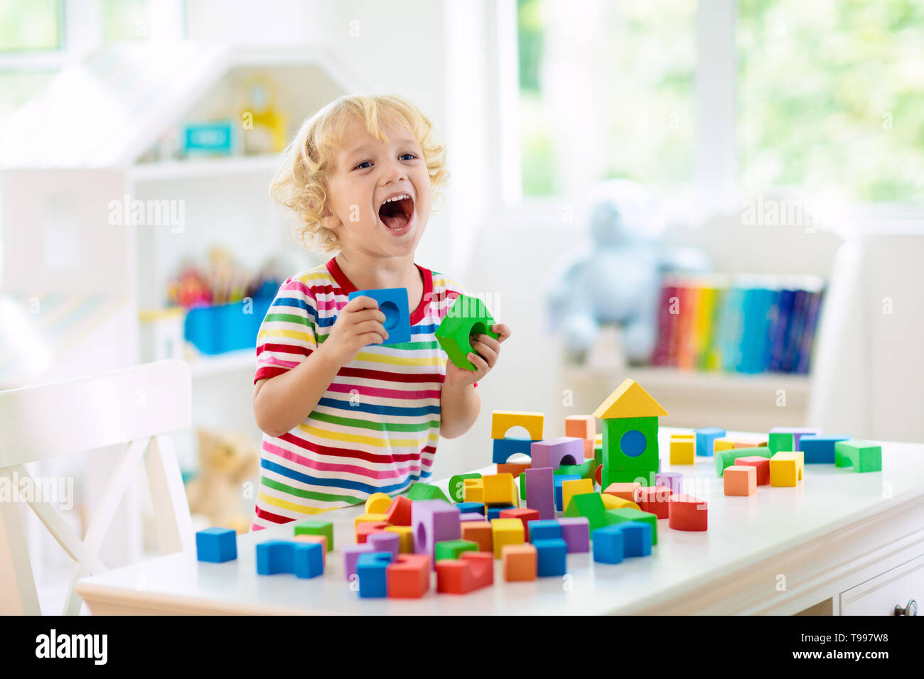 kid playing blocks
