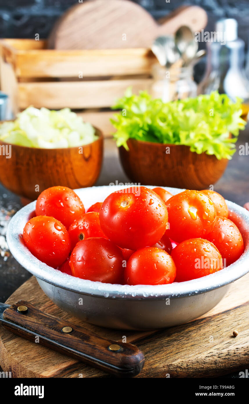 fresh red tomatoes in metal bowl, tomato for salad Stock Photo - Alamy