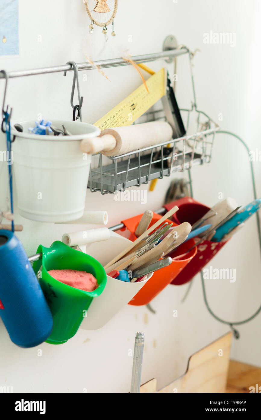 pottery tools for carving ceramic products in workshop Stock Photo
