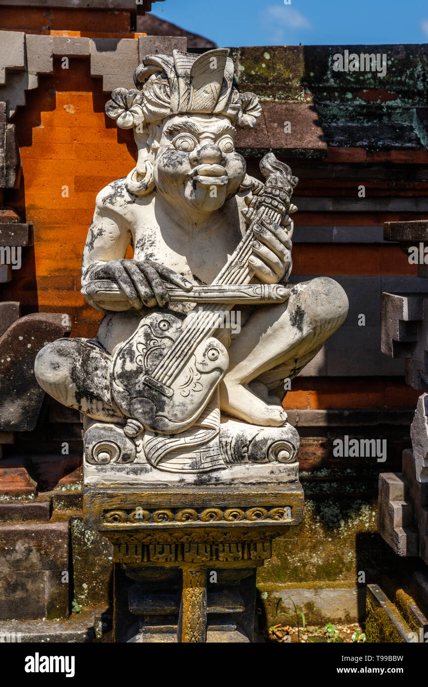 Carved stone statues at Taman Gili Kertha Gosa, remains of a royal palace. Semarapura, Klungkung, Bali, Indonesia. Stock Photo