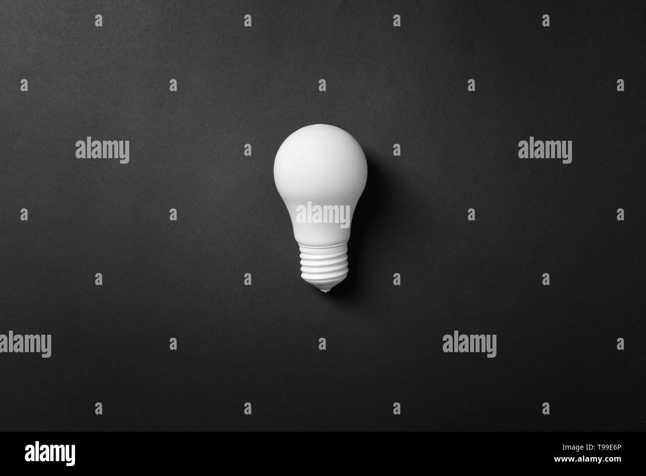 Light bulb on dark background Stock Photo - Alamy