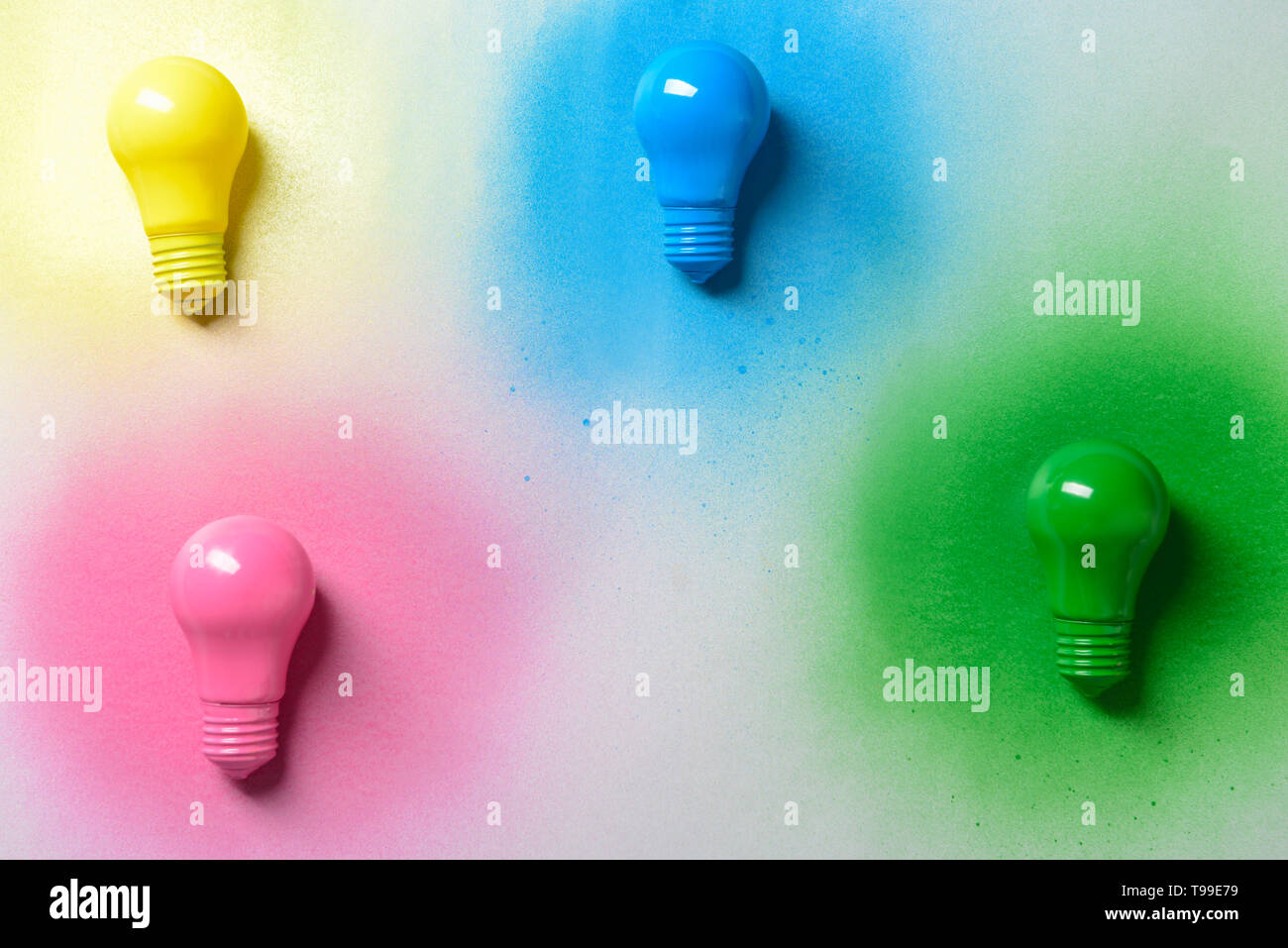 Painted light bulbs on light background Stock Photo