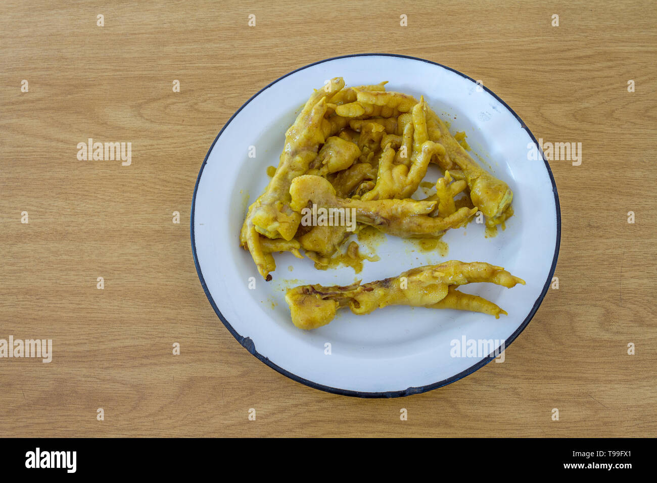 Deep fried chicken feet is a traditional South African township snack