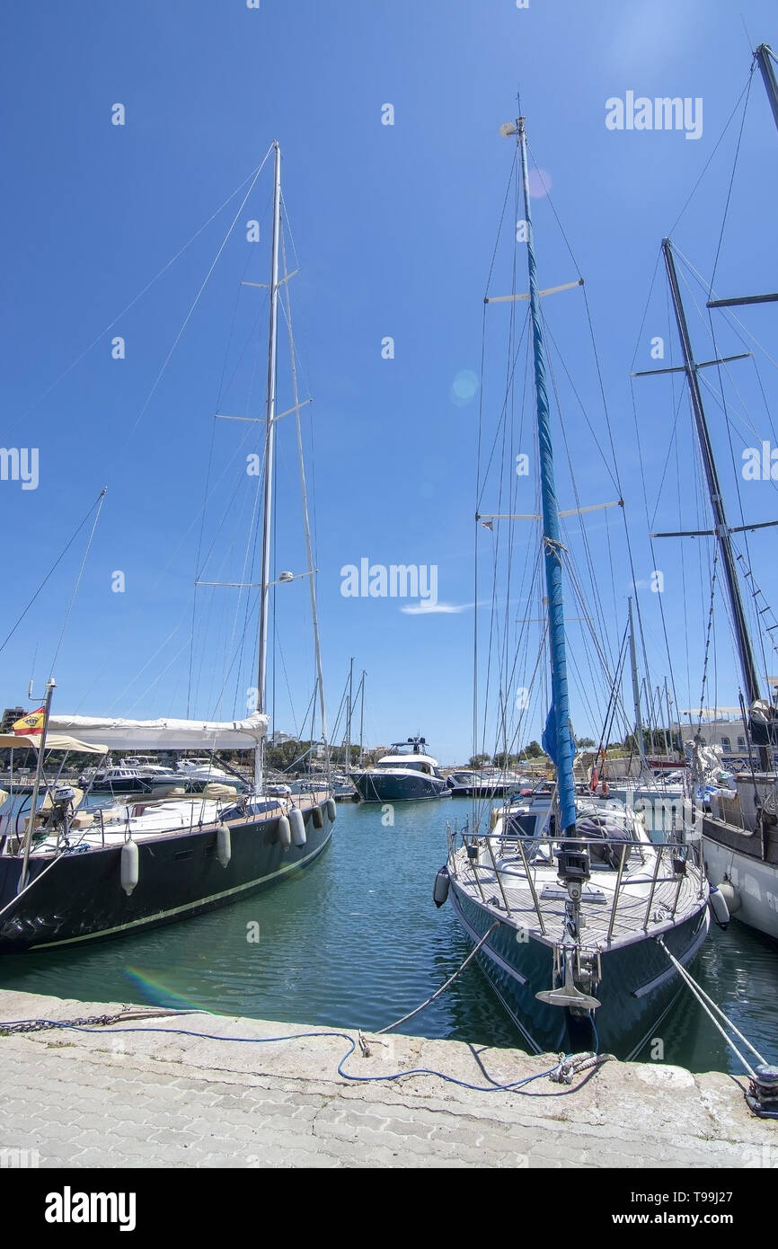 PORTO CRISTO, MALLORCA, SPAIN - MAY 16, 2019: Harbor area with moored small boats on a sunny day on May 16, 2019 in Porto Cristo, Mallorca, Spain. Stock Photo