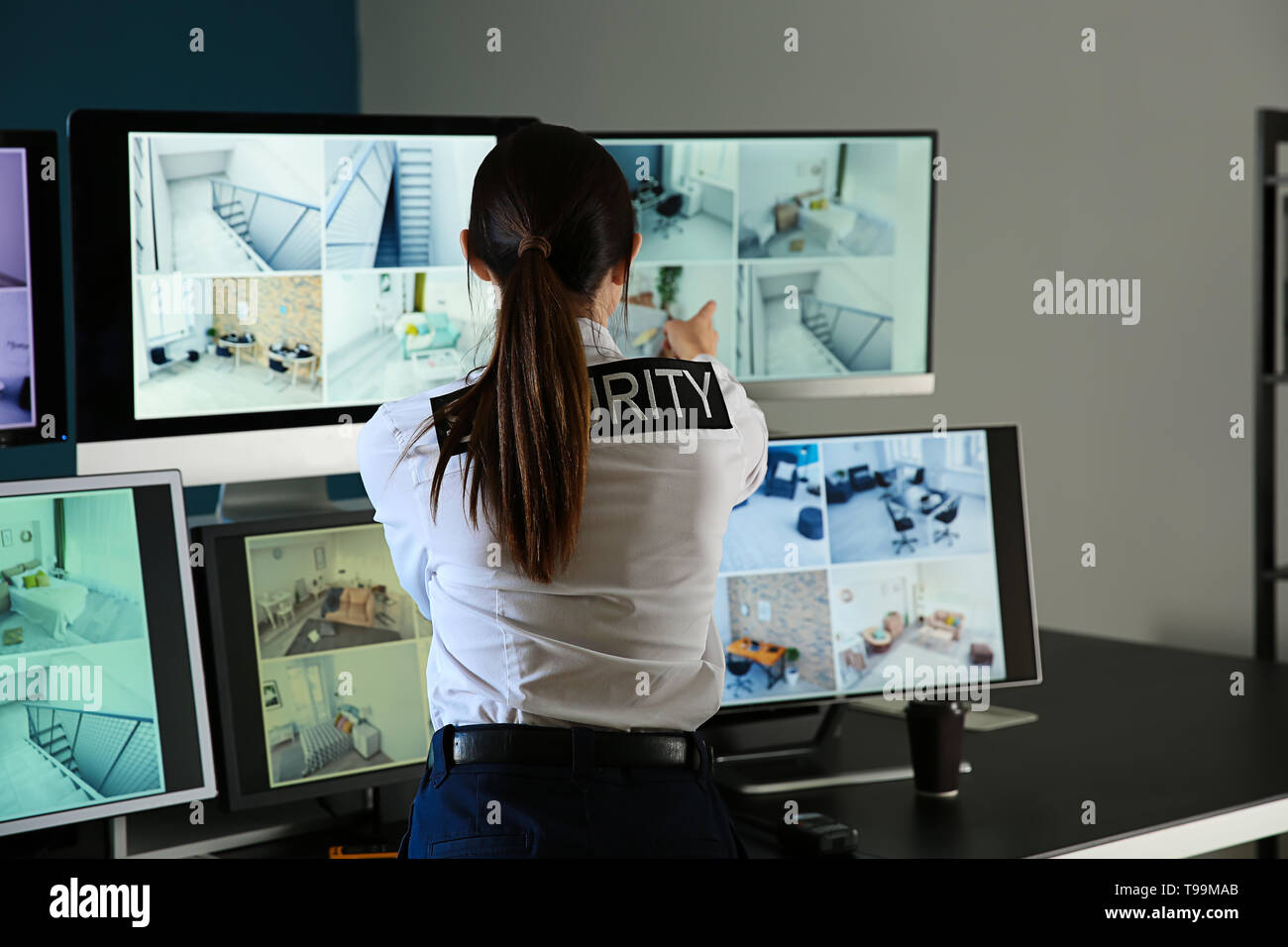 Security Guard Monitoring Modern Cctv Cameras In