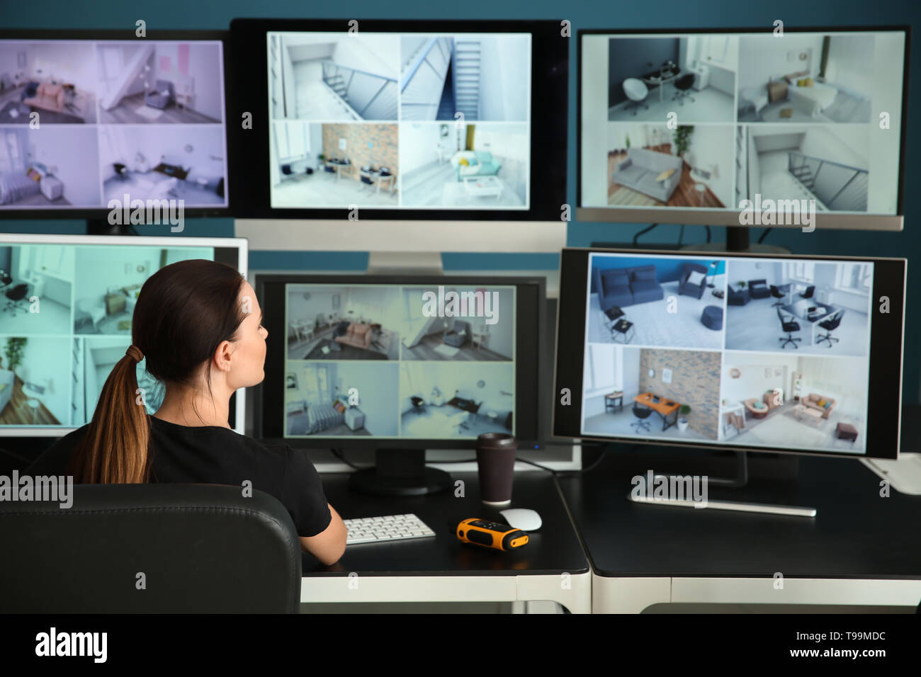 Security Guard Monitoring Modern Cctv Cameras In