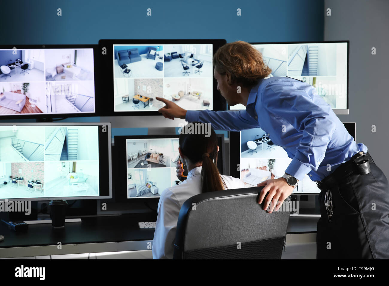Security Guards Monitoring Modern Cctv Cameras In